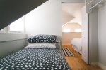 Single bed in the loft in a cozy nook for a child age 9 and under